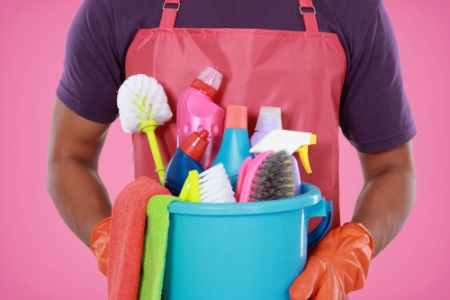 Deep cleaning professional working in a Barnes home interior